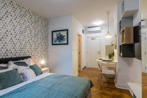 Llit o llits en una habitació de Vracar Apartment