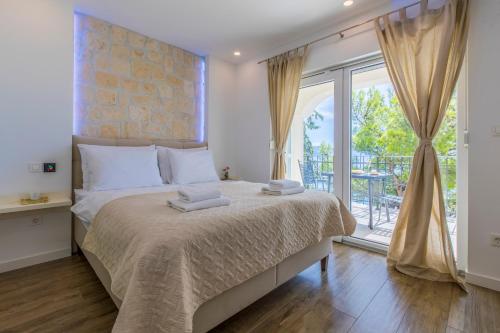 Postel nebo postele na pokoji v ubytování Palace Paulina Residence