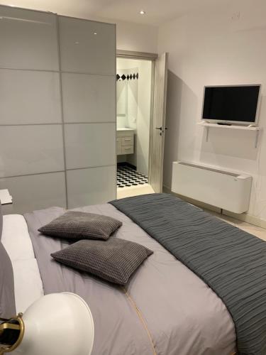 Postel nebo postele na pokoji v ubytování Rialto Mercato apartment suite