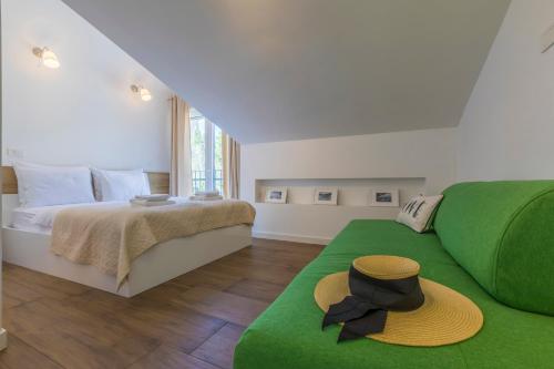 Postel nebo postele na pokoji v ubytování Palace Paulina Apartments