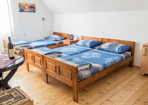 Postel nebo postele na pokoji v ubytování Golubović Apartments