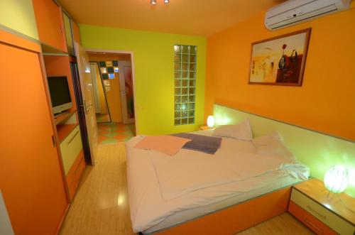Кровать или кровати в номере SC Accommodation & Entertainment SRL