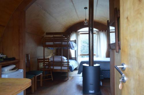 Двухъярусная кровать или двухъярусные кровати в номере Refugios Canto del Agua