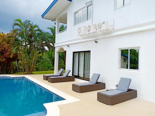 an image of a villa with a swimming pool at Luxury Villa with Pool in Tropical Garden in Puerto Princesa City