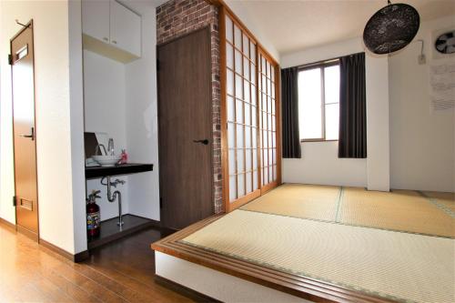 Llit o llits en una habitació de Hotel EL Tochigi 3 free parking