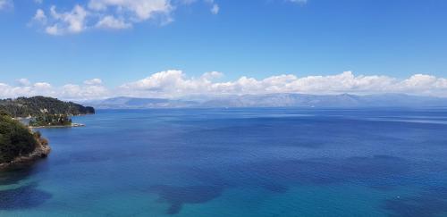 an aerial view of a large body of water at Oasis Hotel in Perama