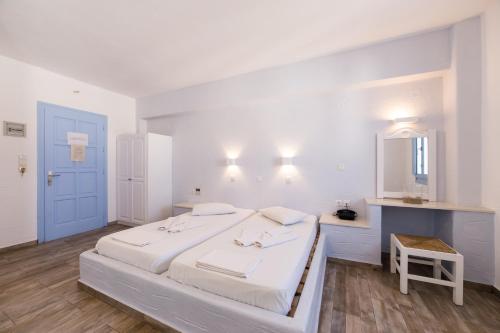 Ένα ή περισσότερα κρεβάτια σε δωμάτιο στο Stratos Apartments & Studios 