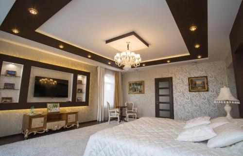 Postel nebo postele na pokoji v ubytování Hotel Villa Venice