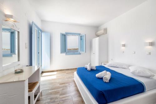 Ένα ή περισσότερα κρεβάτια σε δωμάτιο στο Stratos Apartments & Studios 