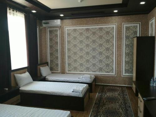 Katil atau katil-katil dalam bilik di hostel Farovon