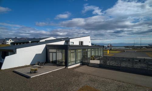 a building with a large window on the roof at Höfn - Berjaya Iceland Hotels in Höfn