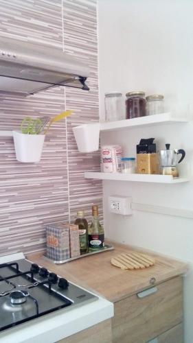 Køkken eller tekøkken på La Quercia Suites - La Torretta