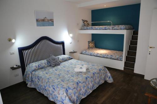Postel nebo postele na pokoji v ubytování House SottoCoperta