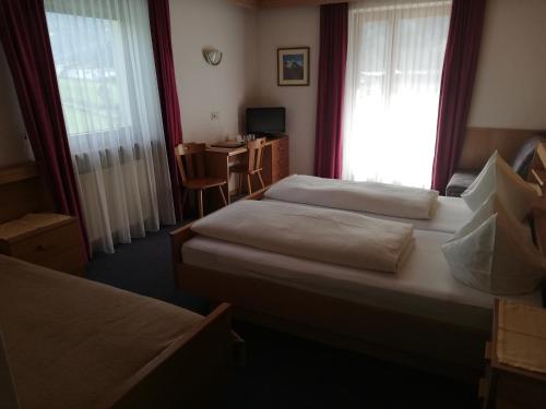 Naturhotel Hallerにあるベッド