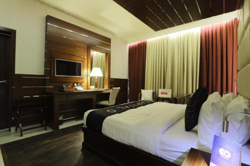 Katil atau katil-katil dalam bilik di Queen Palace Hotel