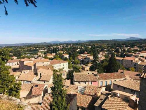 a view of a town with roofs at La Maison d AME - for the perfect stay at the Mont Ventoux in Malaucène