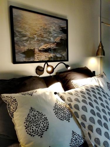 Cama o camas de una habitación en Gårdshuset