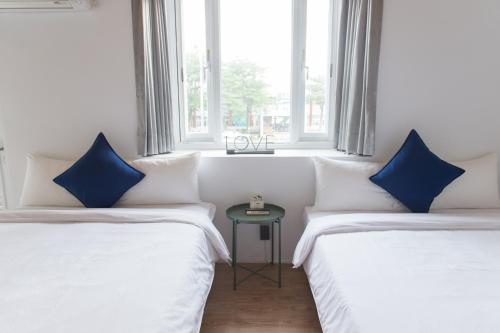 Katil atau katil-katil dalam bilik di HELLO Make Yourself at Home