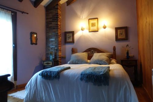 เตียงในห้องที่ llar de Cosme
