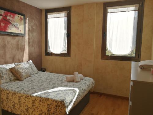 Ένα ή περισσότερα κρεβάτια σε δωμάτιο στο APARTAMENTO L AÜT
