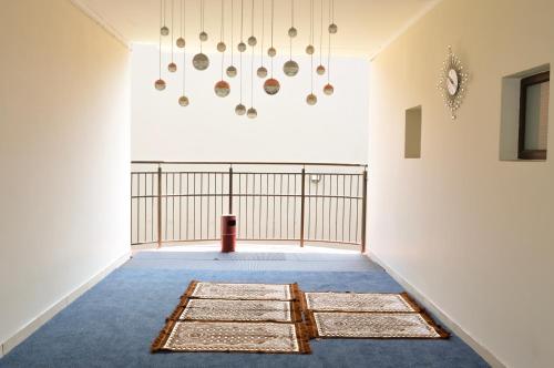 a hallway with rugs on the floor in a room at Millennium hotel in Johannesburg