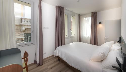 Ένα ή περισσότερα κρεβάτια σε δωμάτιο στο Hotel Canton dell'Orto