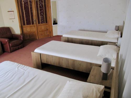Un pat sau paturi într-o cameră la G.EAG - Premium Apartment