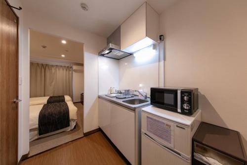 Virtuvė arba virtuvėlė apgyvendinimo įstaigoje Stay SAKURA Nihonbashi / Vacation STAY 50989
