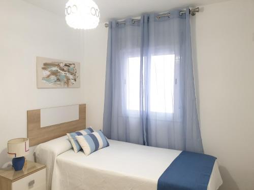 A bed or beds in a room at Doña Lola House