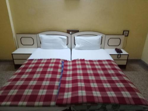 Cama ou camas em um quarto em Hotel Lakeview