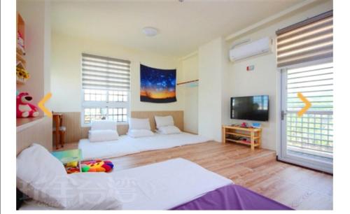 Cama o camas de una habitación en Chuan Men Zih