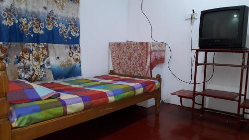 Una cama o camas en una habitación de DERO BEACH HOLIDAY HOME
