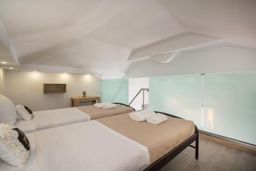 Katil atau katil-katil dalam bilik di B&M HOUSE,SIRILI,PLATANIAS