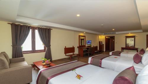 Posezení v ubytování Hotel De La Renaissance