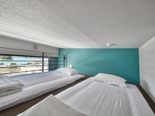 מיטה או מיטות בחדר ב-CABIN&HOTEL ReTIME