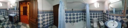 Ett badrum på Monte Rosado viviendas vacacionales