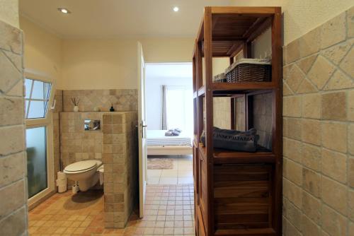 A bathroom at LEON INMO Villa Arisha - 10009