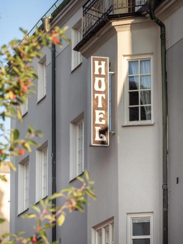 a hotel sign on the side of a building at Ludvika Stadshotell in Ludvika