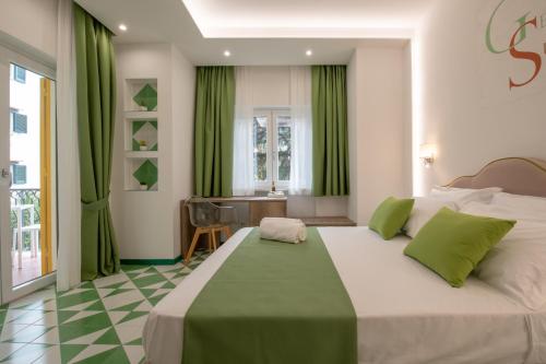 Postel nebo postele na pokoji v ubytování Gea Suite B&B