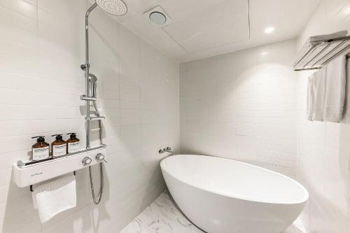 Ένα μπάνιο στο Brown-Dot Hotel Ulsan-Sincheon