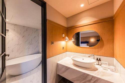 Ένα μπάνιο στο Brown-Dot Hotel Ulsan-Sincheon