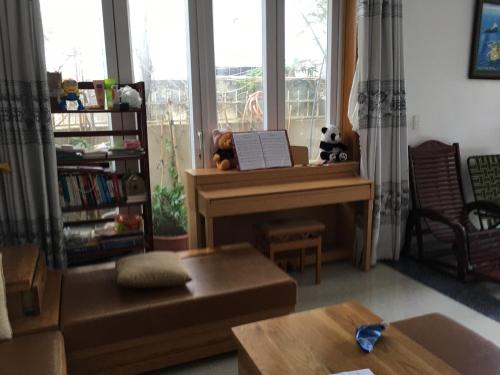 Χώρος καθιστικού στο Thom's Homestay