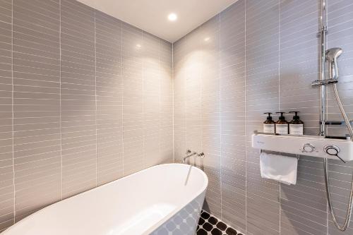 Ένα μπάνιο στο Brown-Dot Hotel Ulsan-Sincheon