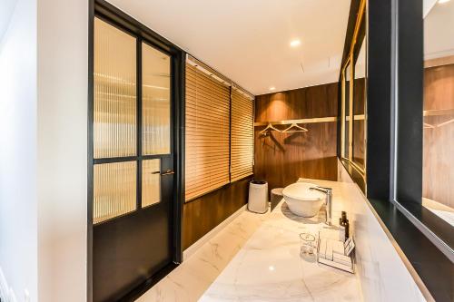 Ένα μπάνιο στο Brown-Dot Hotel Ulsan-Sincheon