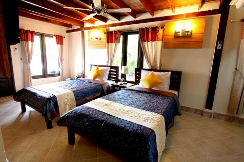 Giường trong phòng chung tại Ao Nang Home Stay - Adults Only