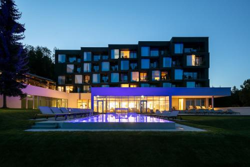 a building with a pool in front of it at Fritz Lauterbad in Freudenstadt