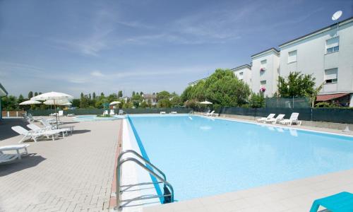 Piscina a Long Beach Village Residence sul mare spiaggia privata inclusa o a prop