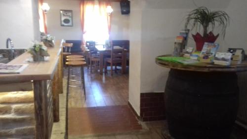 Un restaurante o sitio para comer en Gasthof Muster-Stüberl