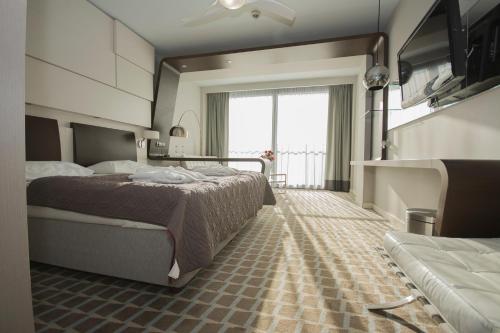 Posteľ alebo postele v izbe v ubytovaní Marine Apartament