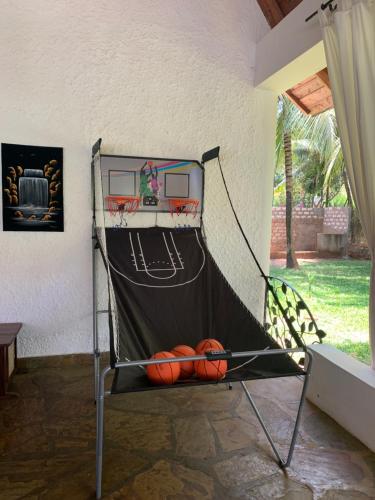 a basketball hoop with a net in a room at Villa Ameera Malindi in Malindi